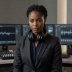 Portrait of Maren Okafor, editor, wearing headphones around her neck